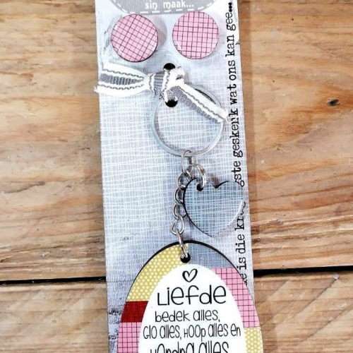 Ovaal Sleutelring en Oorbelle Liefde Bedek Alles